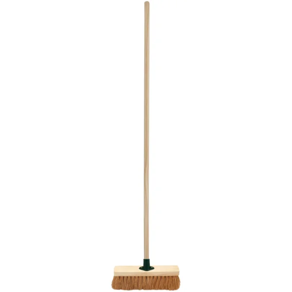 Wooden floor broom with a wide rectangular head and natural bristles, standing upright.