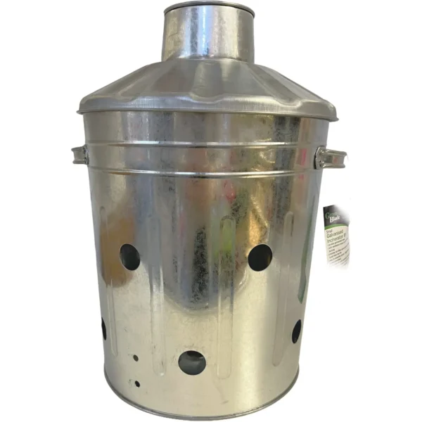 Small galvanized metal incinerator with a domed lid and circular ventilation holes on the sides.