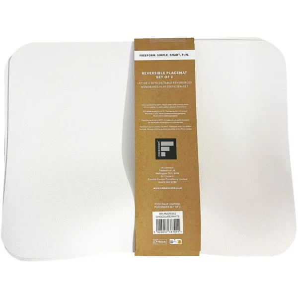 White textured placemats with a brown paper label wrapped around them, reading 'Reversible placemat set of 2'.