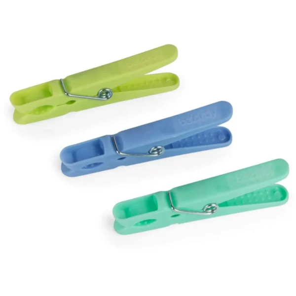 Set of four bright silicone clothespins in lime, blue, teal, and mint with metal springs