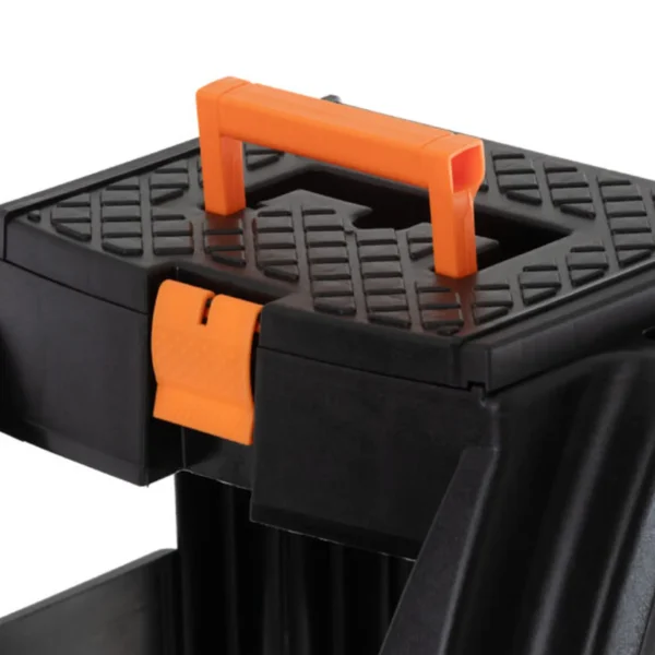 Black plastic toolbox with orange carrying handle and latches, close-up view of the lid.